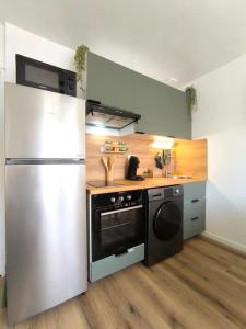 Maisons de vacances NOUVEAU Les Grumes 2 - Maison - 2 chambres - Jardin - Neuf : photos des chambres