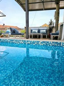 Villa Vi apartmen in a villa with a swimming pool