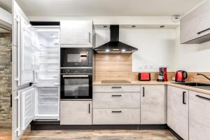 Côté Palais avec Climatisation - Fibre & Netflix - Spacieux en rez-de-chaussée