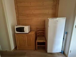 Appartements Studio avec coin montagne - 4 pers, a 100m des telecabines, piscine, parking, casier a ski - FR-1-330F-94 : photos des chambres