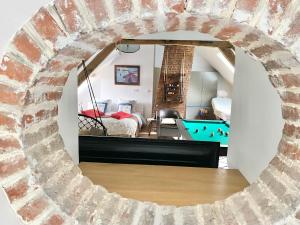 Appartements Loft Romantique - Balneo - Billard - Massage : photos des chambres