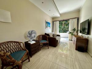 Guarujá Praia do Tombo! Ar, Piscina, Vaga, WIFI, TV Smart, perto da praia!