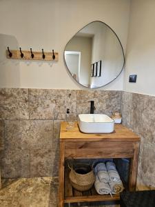 Appartements Ancienne cave a vin renovee : photos des chambres