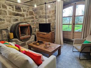 Appartements Ancienne cave a vin renovee : photos des chambres