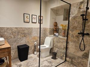 Appartements Ancienne cave a vin renovee : photos des chambres