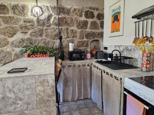 Appartements Ancienne cave a vin renovee : photos des chambres