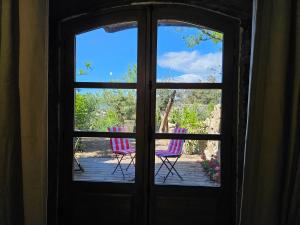 Appartements Ancienne cave a vin renovee : photos des chambres