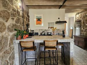 Appartements Ancienne cave a vin renovee : photos des chambres