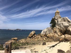 Maisons de vacances hjem Port Blanc A breathtaking setting facing th : photos des chambres