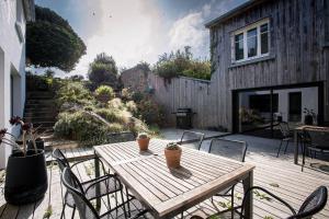 Maisons de vacances hjem Port Blanc A breathtaking setting facing th : photos des chambres