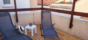 Maisons de vacances La Terrasse sur les toits du centre ville a 300m de la plage : photos des chambres