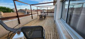 Maisons de vacances La Terrasse sur les toits du centre ville a 300m de la plage : photos des chambres