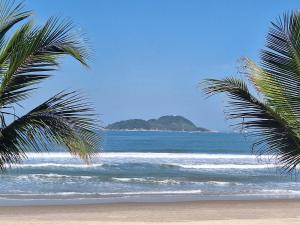 Duplex pé na areia, praia do Tombo - GuarujáSP.