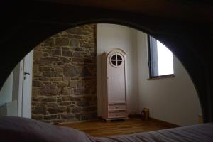 Maisons de vacances Le Moulin du Gwalarn, charme avec jacuzzi : photos des chambres