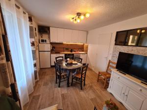 Appartements Escapade Montagne en Famille, appartement cosy avec piscine couverte : photos des chambres