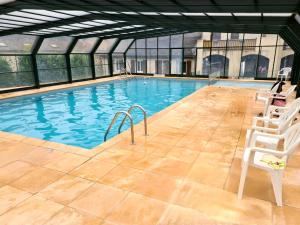 Appartements Escapade Montagne en Famille, appartement cosy avec piscine couverte : photos des chambres