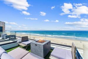 Luxury oceanfront fourplex with roof deck sleeps 22
