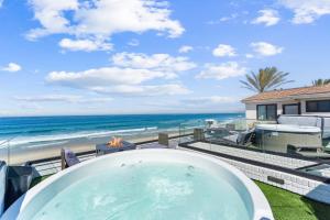 Luxury oceanfront fourplex with roof deck sleeps 22