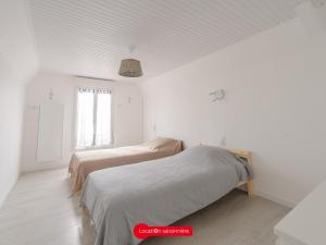 Maisons de vacances Maison Familiale a Chatelaillon-Plage, 800m de la plage, 3 chambres, Jardin cloture, Proche La Rochelle - FR-1-535-57 : photos des chambres