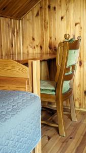 Różany Ogród - dom pod lasem, z widokiem na jezioro i kominkiem, rowery, łódka, rowerek wodny