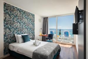 Deluxe Single Room with Sea View room in Hotel Mimosa - Maslinica Hotels & Resorts