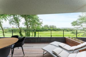 Luxe app aan zee omringd door groene oase - 6p