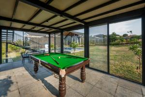SaffronStays Black Rock - 3BR pet-friendly eco-luxe villa with pool, game room & sunrise deck in Nashik