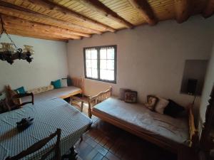 Maisons de vacances Maison authentique avec jardin : photos des chambres