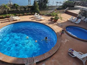 Tiny house Taormina mare with sofa bed - mini stanza Taormina mare con divano letto