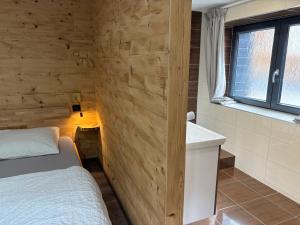 Appartements La Ferme de Rochesson, Jacuzzis & Piscine commune : photos des chambres