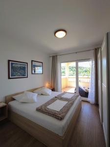 Apartment in Kampor with sea view, balcony, air conditioning, WiFi (4838-1)