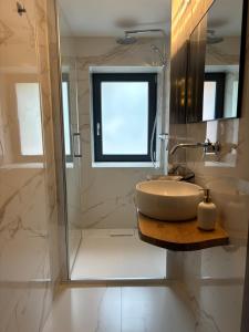 Appartements La Ferme de Rochesson, Jacuzzis & Piscine commune : photos des chambres
