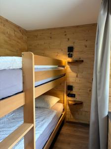Appartements La Ferme de Rochesson, Jacuzzis & Piscine commune : photos des chambres
