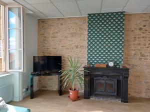 Appartements Les Meubles des Pierres Dorees - Gite de charme pour groupe : photos des chambres