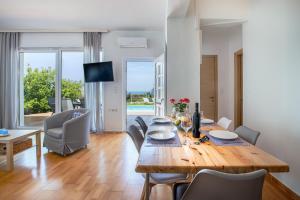 DIMITRA apartment with private pool and sea view -the ground floor of a two storey building