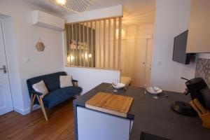 Appartements Une petite escale dans le centre historique : photos des chambres