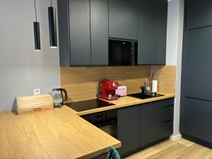 TOTU TODAY-SIENNA GROBLA APARTAMENTY, Faktura VAT, self check-in