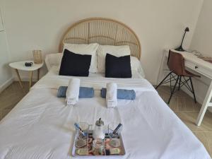 Appartements Studio L'echappee avec lit double et parking sous-sol privatif : photos des chambres