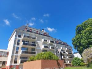 Appartements Studio L'echappee avec lit double et parking sous-sol privatif : photos des chambres