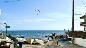 Caleta Blue Ocean on the Beach by Deihu Experiences