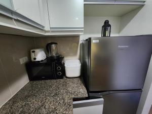 81 Newport C5 10i Balcony & Pool across NAIA T3