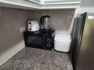 81 Newport C5 10i Balcony & Pool across NAIA T3