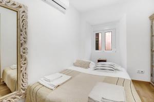 2BR renovated heart of Santos w AC | By Airnest