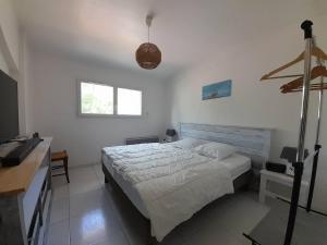 Maisons de vacances Maison spacieuse pres de la mer a Saint-Brevin, 8 pers, jardin, WiFi, jeux, parking, bebe. - FR-1-392-126 : photos des chambres
