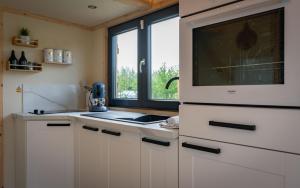 Chalets Tiny house au coeur du marais : photos des chambres