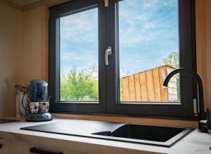 Chalets Tiny house au coeur du marais : photos des chambres