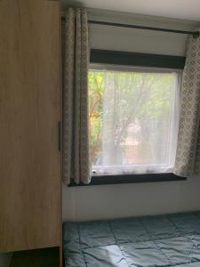 MH 008 Bora Bora sur emplacement exceptionnel en lisière de forêt dans camping 4 étoiles