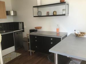 Appartements Appartement avec vue sur le lac du Bourget : photos des chambres