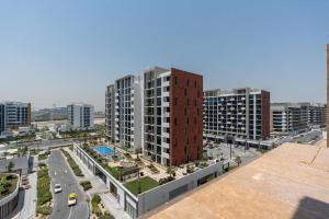 Studio - 12 min downtown - Pool - Azizi Riviera