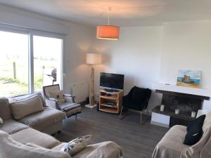 Maisons de vacances Maison en bord de mer : photos des chambres